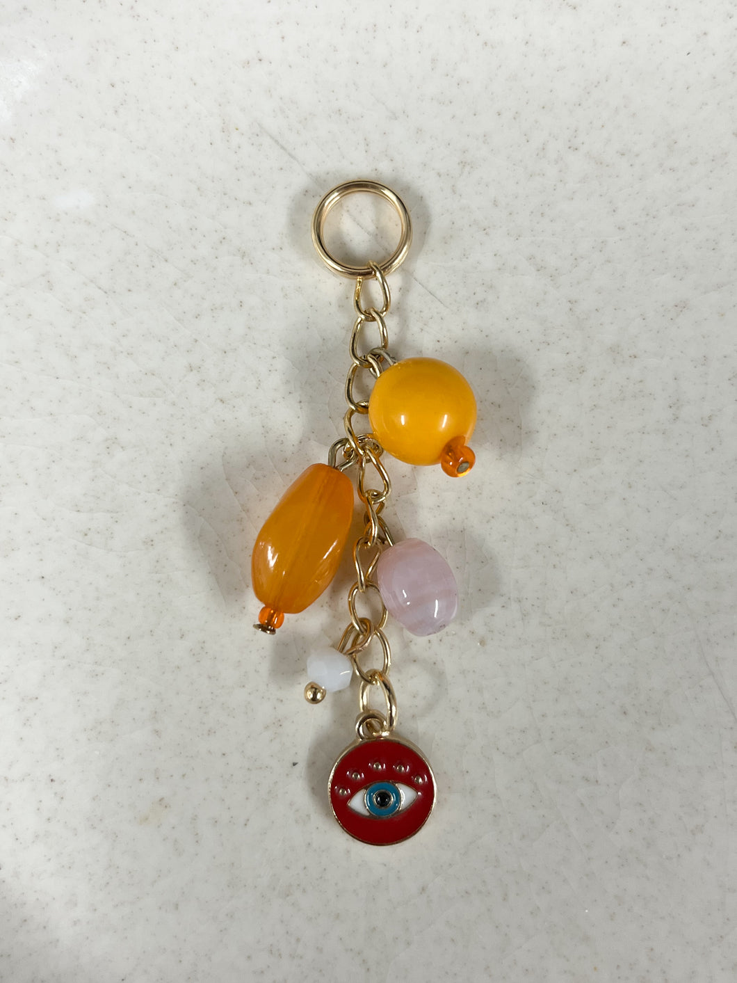 Red Eye Sun Charm